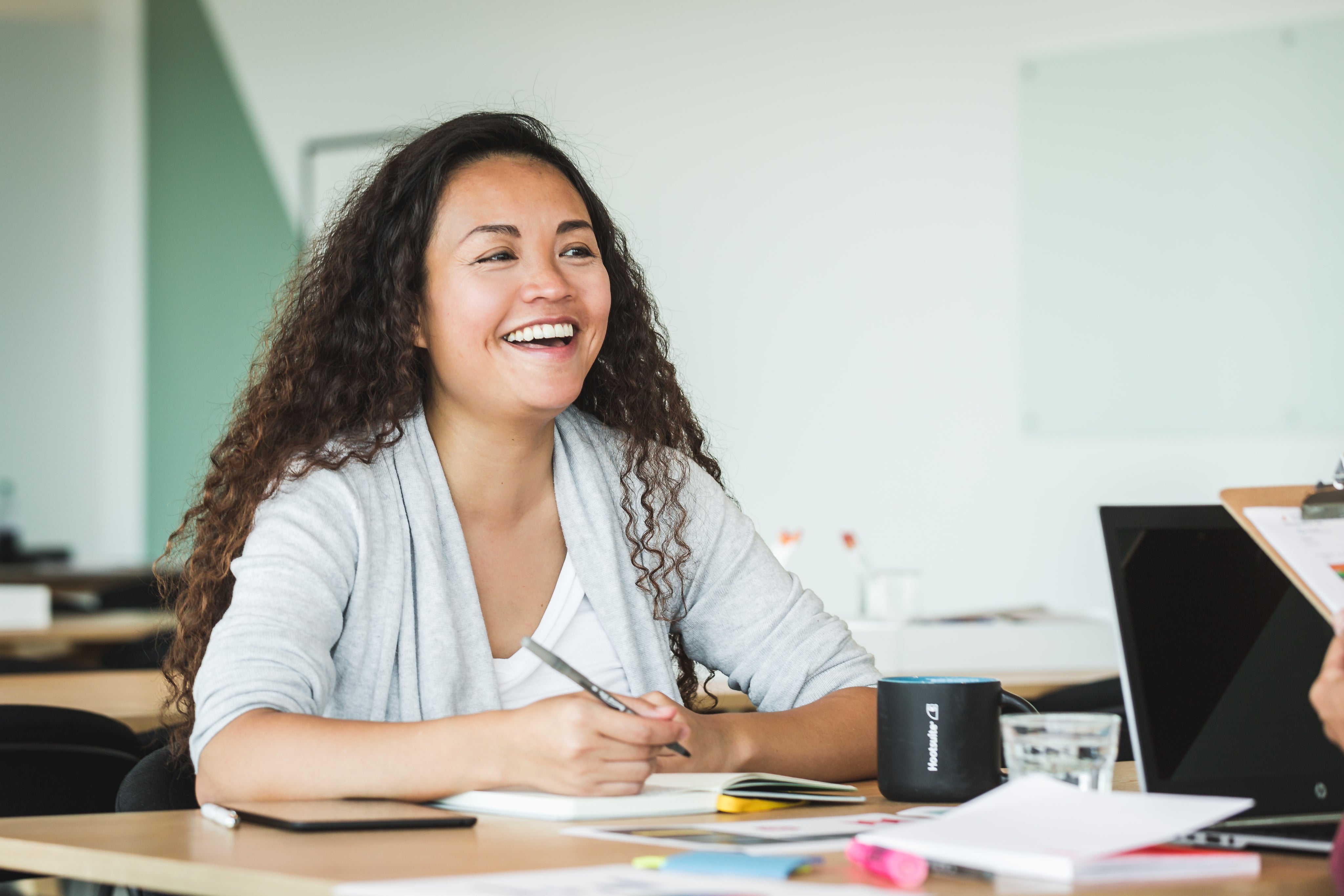 files/happy-woman-at-work.jpg